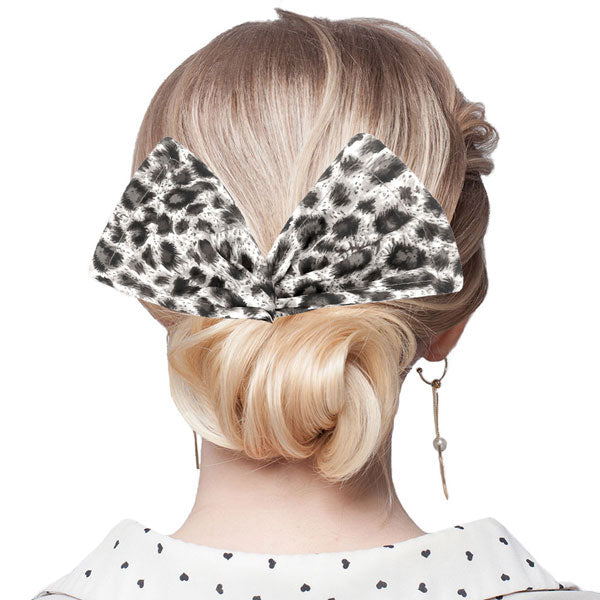 Leopard Patterned Deft Bun Maker Hair Band. Deft Bun Maker Hair Band making you feel extra glamorous. Push back your hair with this pretty Bun Maker Hair Band, add a pop of color to any plain outfit! Be ready to receive compliments. Be the ultimate trendsetter wearing this chic headband with all your stylish outfits!