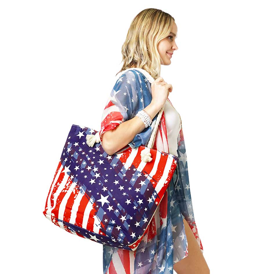 Multi American USA Flag Print Beach Tote Bag, Tote your beach-bound essentials in a patriotic style tote done with an American Flag exterior. Whether you're shopping, heading to the pool, or the beach, this American USA Flag Print Tote Bag is the perfect accessory.