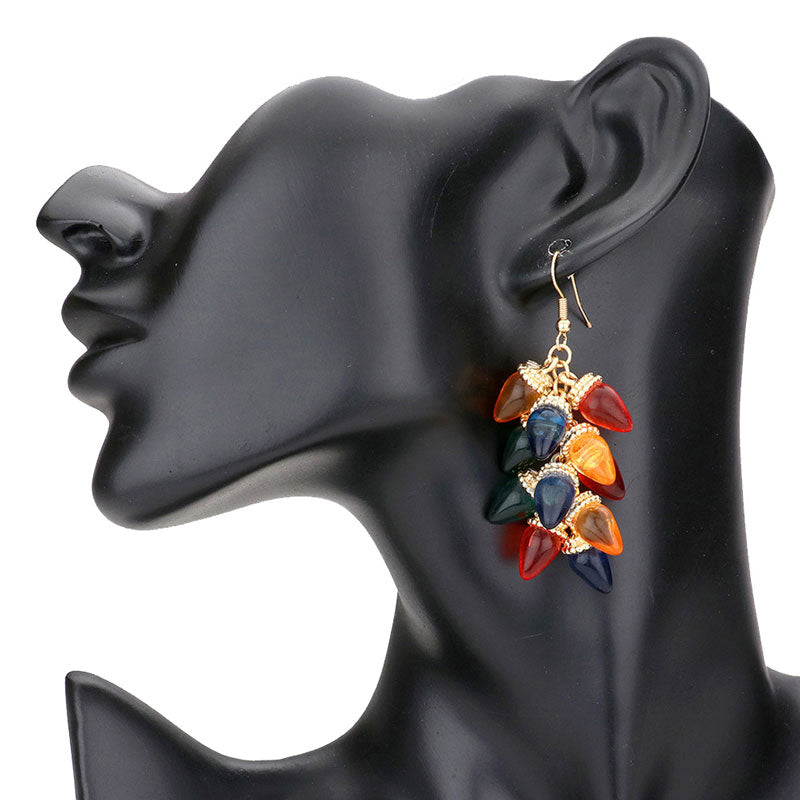 Multi Christmas Light Bulb Dangle Earrings, make your Christmas appearance colorful with these multicolored Christmas theme earrings. These adorable earrings are bound to cause a smile or two while they will dangle on your earlobes. Perfect Gift December Birthdays, Christmas, Stocking Stuffers, Secret Santa, BFF, etc. Embrace the season with the Christmas spirit.