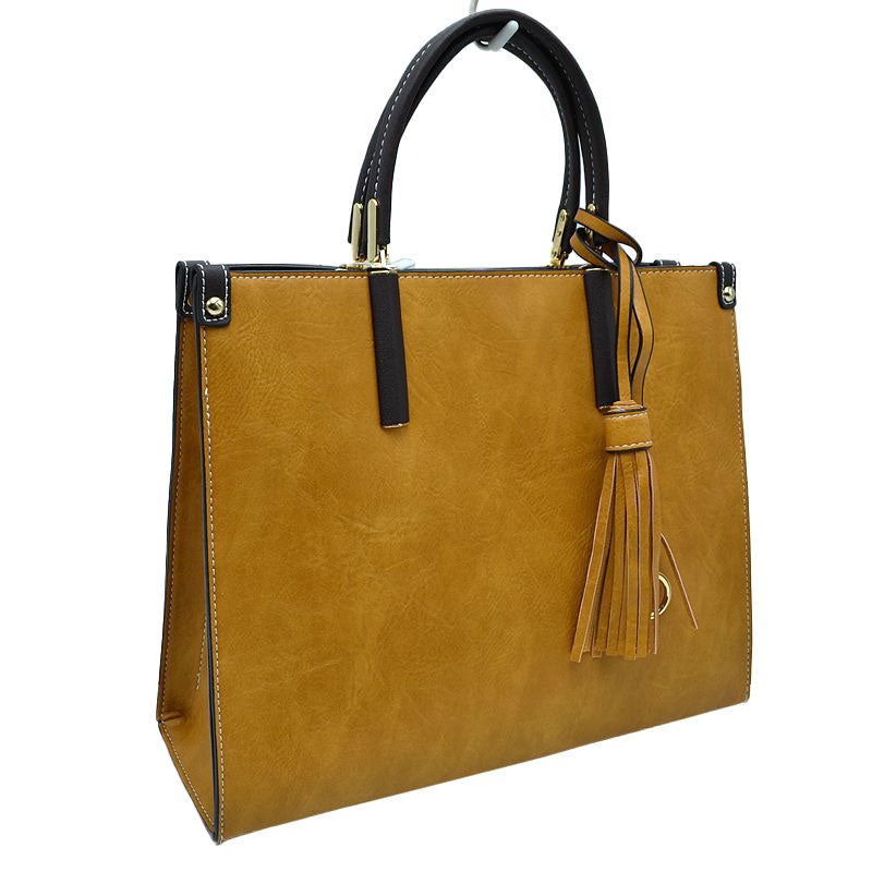 Mustard Large Shoulder Vegan Leather Tassel Handbag For Women. High quality Vegan Leather is a luxurious and durable, Stay organized in style with this square-shaped shopper tote bag that is fully two contrasting interior and exterior solid colors. This vegan leather handbag includes an on-trend removable tassel embellishment. Guaranteed, This will be your go-to handbag.