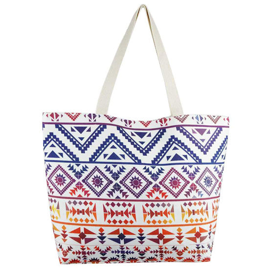 Navy Colorful Tribal Pattern Beach Tote Bag. Show your trendy side with this awesome Tribal Pattern beach tote bag. Spacious enough for carrying any and all of your seaside essentials. The straps helps carrying this shoulder bag comfortably. Perfect as a beach bag to carry foods, drinks, big beach blanket, towels, swimsuit, toys, flip flops, sun screen and more.