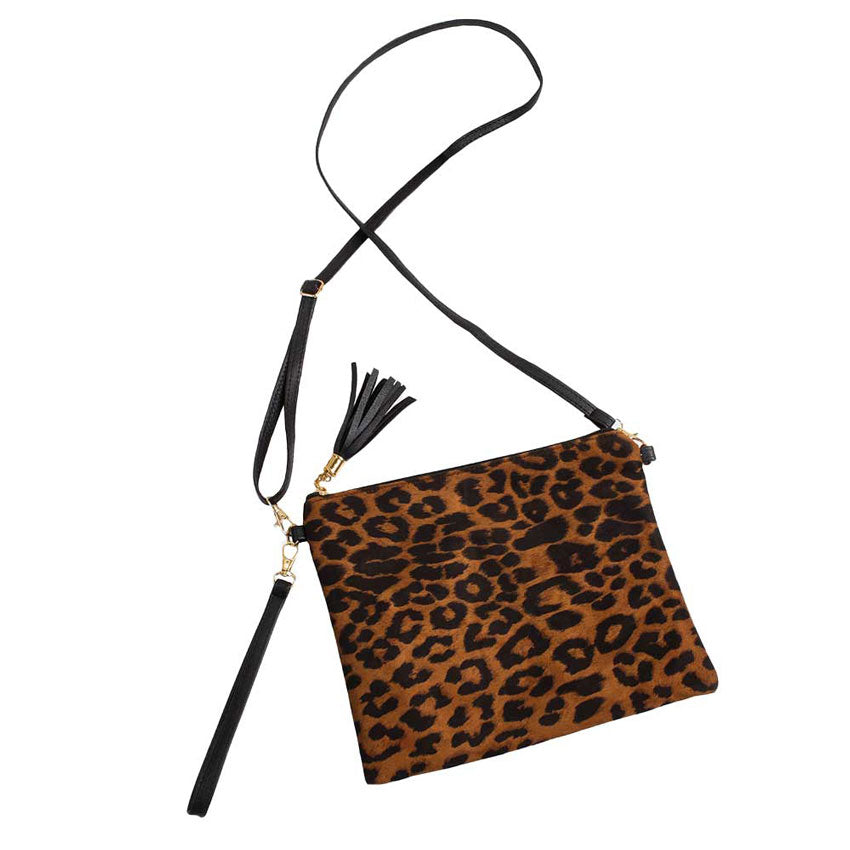 Tan Leopard Print Crossbody Clutch Bag. Be the ultimate fashionista carrying this trendy crossbody clutch bag! great for when you need something small to carry or drop in your bag. perfect for the festive season, embrace the Leopard themed spirit with these bag, these pretty gift Crossbody Bags are sure to bring a smile to your face.