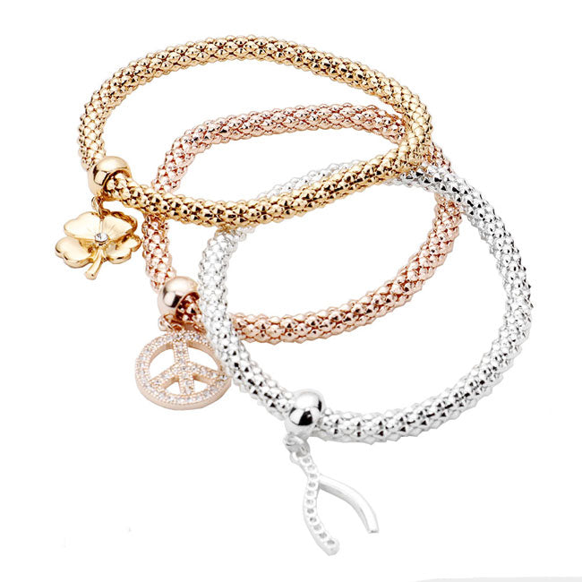 Three Tone 3PCS Clover Peace Wishbone Charm Stretch Bracelets. These Clover themed stretchable bracelets can light up any outfit, and make you feel absolutely flawless. Fabulous fashion and sleek style adds a pop of pretty color to your attire, coordinate with any ensemble from business casual to wear. Perfect Birthday Gift, Anniversary Gift, Mother's Day Gift, Mom Gift, Thank you Gift, Just Because Gift.