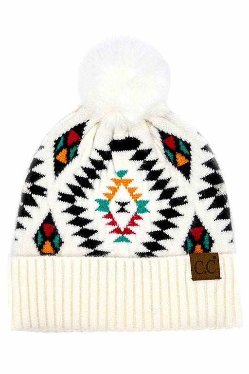 White C.C Soft Aztec Pattern Beanie with Faux Fur Pom, is beautifully knitted with a variety of colors and design that brings a unique look. Coordinate these aztec pattern beannie with any outfit to match the best with absolute warmth and coziness in style. This is an ideal winter head cover that comes in one size winter cap with a faux fur pom that fits most head sizes. Perfect winter gift accessory for your friends, family, and the persons you love.