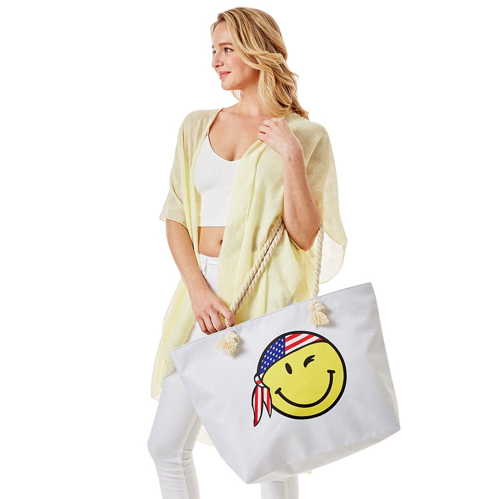 White Yellow Smile Face With USA Bandana Print Beach Tote Bag, Tote your beach-bound essentials in a patriotic style tote done with an smile face with USA bandana exterior. Show your love for Your country with this sweet patriotic smile face with USA bandana print tote bag. Whether you're shopping, heading to the pool, or the beach, this USA flag in smile face Print tote bag is the perfect accessory.