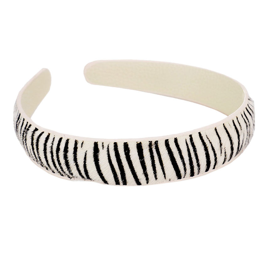 White Zebra Pattern Genuine Leather Headband, extract your glamour with an awesome look. Push back your hair with this zebra pattern headband to show you up in a stylish way. Spice up any plain outfit and be ready to receive compliments. Be the ultimate trendsetter wearing this chic headband with all your stylish outfits! It's perfect for covering up a bad hair day! A beautiful gift for the persons you care about the most, even yourself! Stay fashionable.