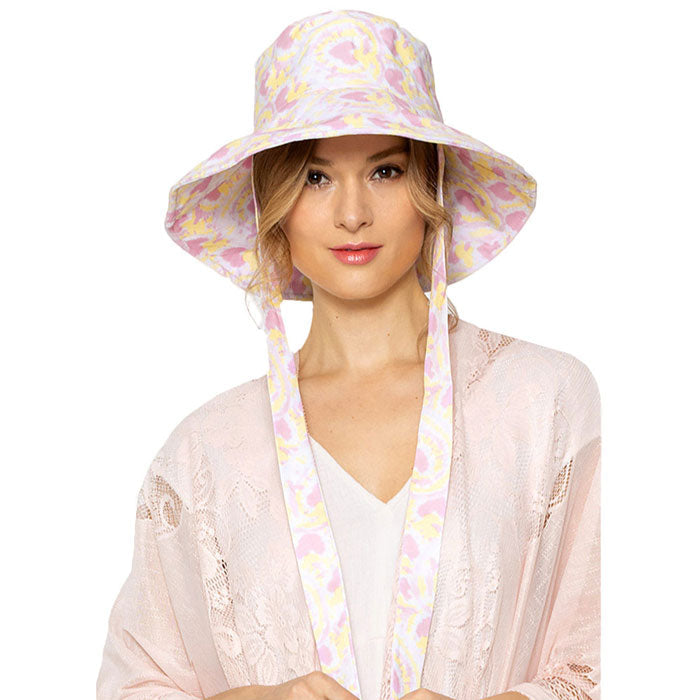 Yellow Watercolored Chin Tie Bucket Hat. Show your trendy side with this chin Tie bucket hat. Have fun and look Stylish. Great for covering up when you are having a bad hair day and still looking cool. Perfect for protecting you from the sun, rain, wind, snow, beach, pool, camping or any outdoor activities.