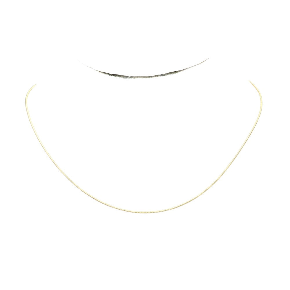Gold 16 INCH, 1mm Stainless Steel Metal Chain Necklace is a sleek and durable option for everyday wear. Made with high-quality stainless steel, it is resistant to tarnishing and hypoallergenic. It is perfect for adding a touch of style to any outfit.
