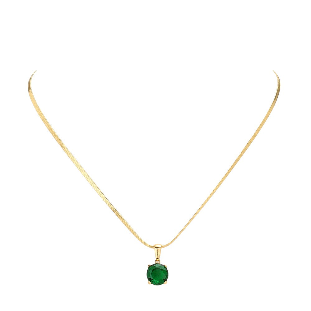 Green 18K Gold Dipped Stainless Steel CZ Round Pendant Necklace exudes elegance and durability. The high-quality material ensures long-lasting wear, while the stunning CZ round pendant adds a touch of glamour. Its timeless design makes it a versatile addition to any jewelry collection. Perfect for any occasion. 