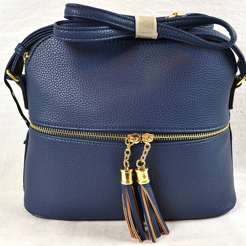 Daily Dome Tassel Crossbody