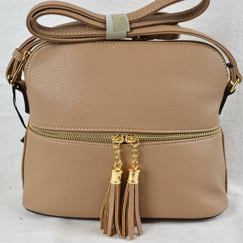 Daily Dome Tassel Crossbody
