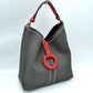 Pebbled Bucket Bag with Contrast Ring Accent and Top Handle - Bucket Bag