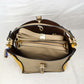 Studded Two-Tone Bucket Bag with Top Handle and Decorative Strap - Bucket Bag