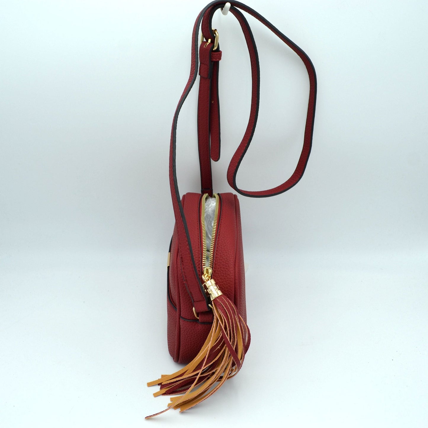 Pebbled Camera Crossbody Bag with Large Statement Tassel Accent - Crossbody Bags