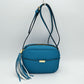 Pebbled Camera Crossbody Bag with Large Statement Tassel Accent - Turquoise - Crossbody Bags