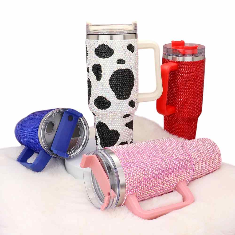 AB Red White Bling Studded 40oz Stainless Steel Tumbler is the perfect blend of style and functionality. With its studded design and large 40oz capacity, it's the ideal choice for those looking to add some bling to their daily hydration routine. Made with durable stainless steel, this tumbler will keep your drinks at the perfect temperature for hours. Say goodbye to lukewarm beverages and hello to an elevated hydration experience.