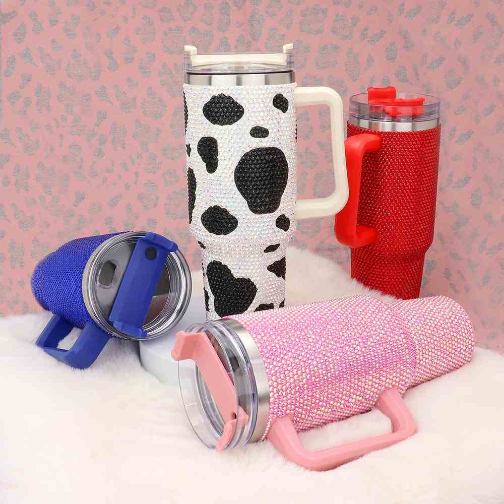 AB Sapphire White Bling Studded 40oz Stainless Steel Tumbler is the perfect blend of style and functionality. With its studded design and large 40oz capacity, it's the ideal choice for those looking to add some bling to their daily hydration routine. Made with durable stainless steel, this tumbler will keep your drinks at the perfect temperature for hours. Say goodbye to lukewarm beverages and hello to an elevated hydration experience.