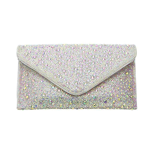 AB Silver Bling Stone Studded Clutch Bag doubles as a crossbody bag as well, making it a versatile and stylish choice for any evening occasion. The bling stones add a touch of glamour, while the flap envelope design keeps your belongings secure. Perfect for a night out, this bag will elevate any outfit.