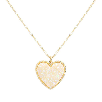 AB White Druzy Heart Pendant Necklace, this is a stunning accessory that adds a touch of sparkle to any outfit. The druzy heart pendant is beautifully crafted and catches the light for a mesmerizing effect. With its unique design and high-quality materials, this necklace is sure to make a statement and elevate your look.