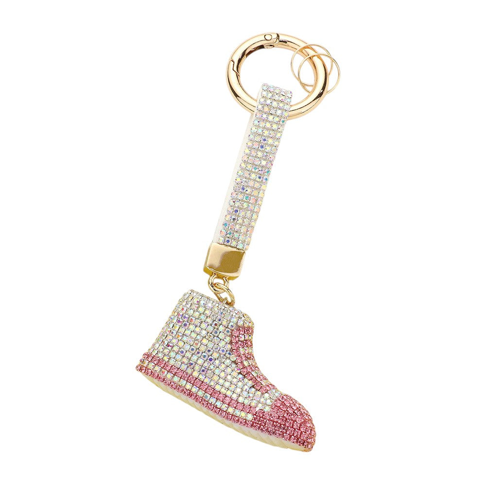 AB Rhinestone Pave Sneaker Bag Charm features a sparkling rhinestone pave design that is sure to add a touch of glamour to any bag. The charm is perfect for sneaker lovers and fashionistas alike, making it a versatile and stylish accessory. With its high-quality construction, this charm is a must-have for any fashion-forward individual.