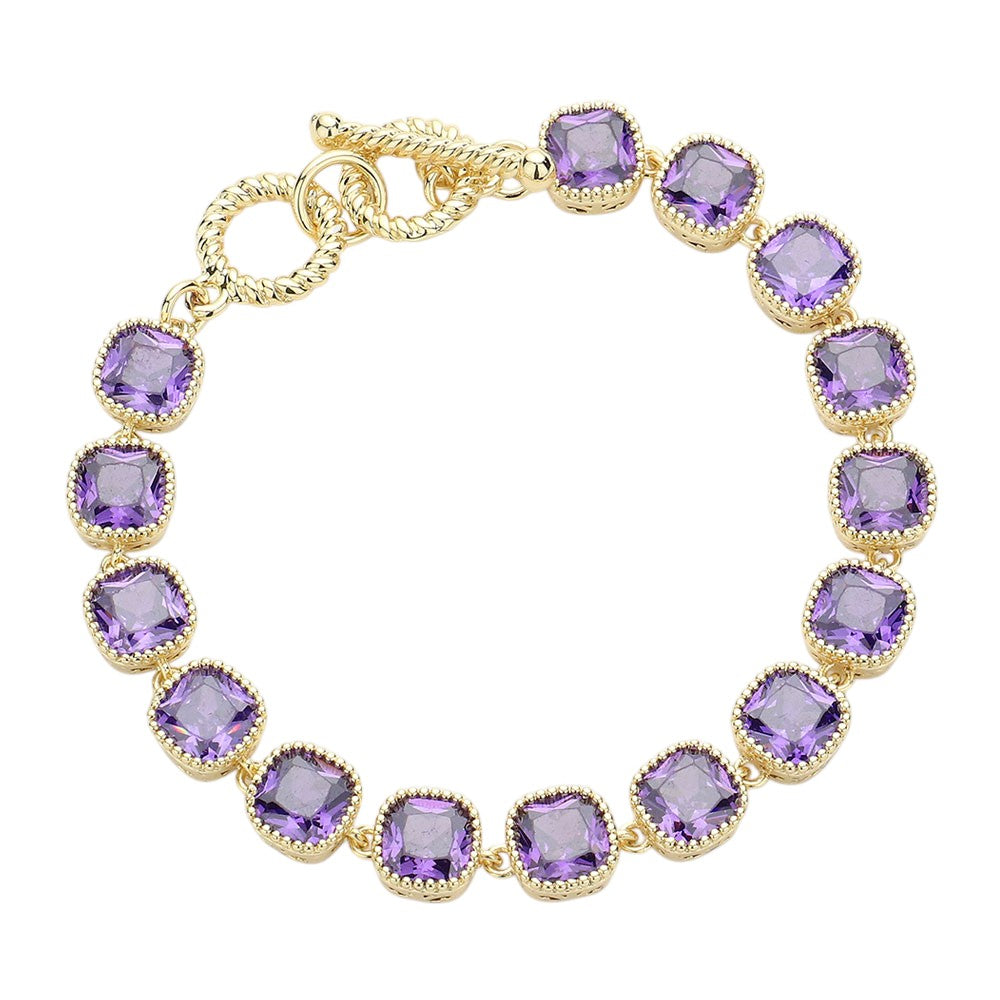 Amethyst Gold 14K Gold Plated Square CZ Stone Link Evening Toggle Bracelet adds a touch of elegance to any outfit. The sparkling CZ stones and sturdy toggle clasp make it the perfect accessory for special occasions. Enjoy the luxurious look and feel of this high-quality bracelet