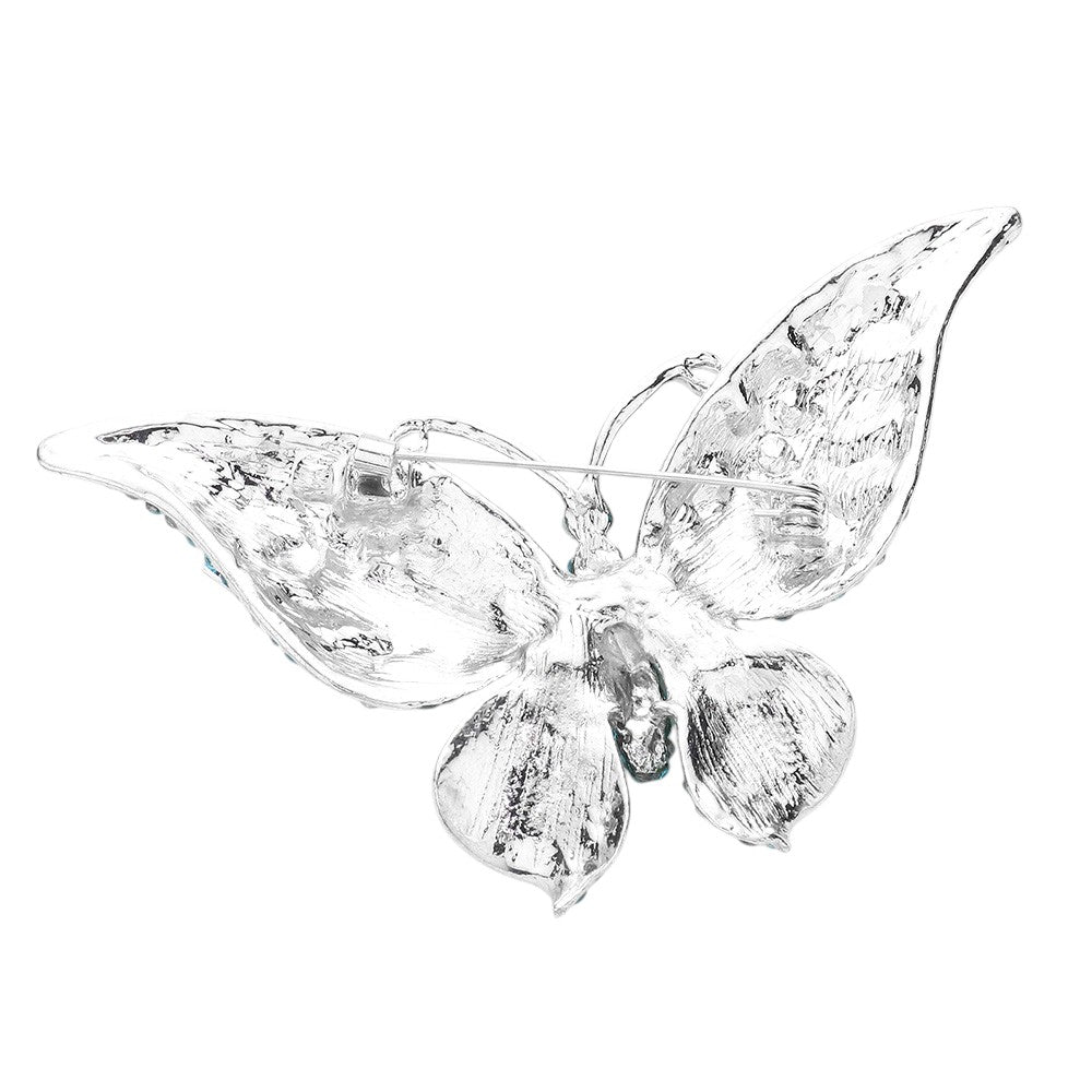 Aqua Glass Crystal Butterfly Pin Brooch is expertly crafted with sparkling glass crystals, adding a touch of elegance and sophistication to any outfit. With its timeless butterfly design, this tasteful accessory is perfect for any occasion. Enhance your ensemble with a touch of shimmer and charm.