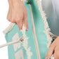 Mint BEACH Message Embroidered Fringe Tote Bag / Beach Bag is perfect for any beach day. With its spacious interior and stylish embroidered fringe detailing, it's both functional and fashionable. Carry all your beach essentials in one convenient and trendy tote. 