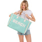 Mint BEACH Message Embroidered Fringe Tote Bag / Beach Bag is perfect for any beach day. With its spacious interior and stylish embroidered fringe detailing, it's both functional and fashionable. Carry all your beach essentials in one convenient and trendy tote. 