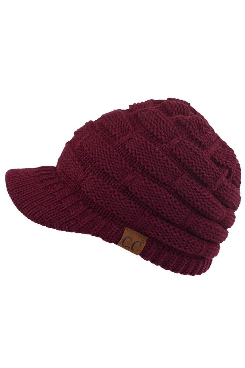 Berry The C.C Ribbed Knit Brim Beanie combines comfort and style in one versatile piece. Made from 100% acrylic, this lightweight beanie features a classic ribbed knit construction with a structured brim for added warmth and coverage. Perfect for casual outings or outdoor activities, it pairs effortlessly with any winter wardrobe.