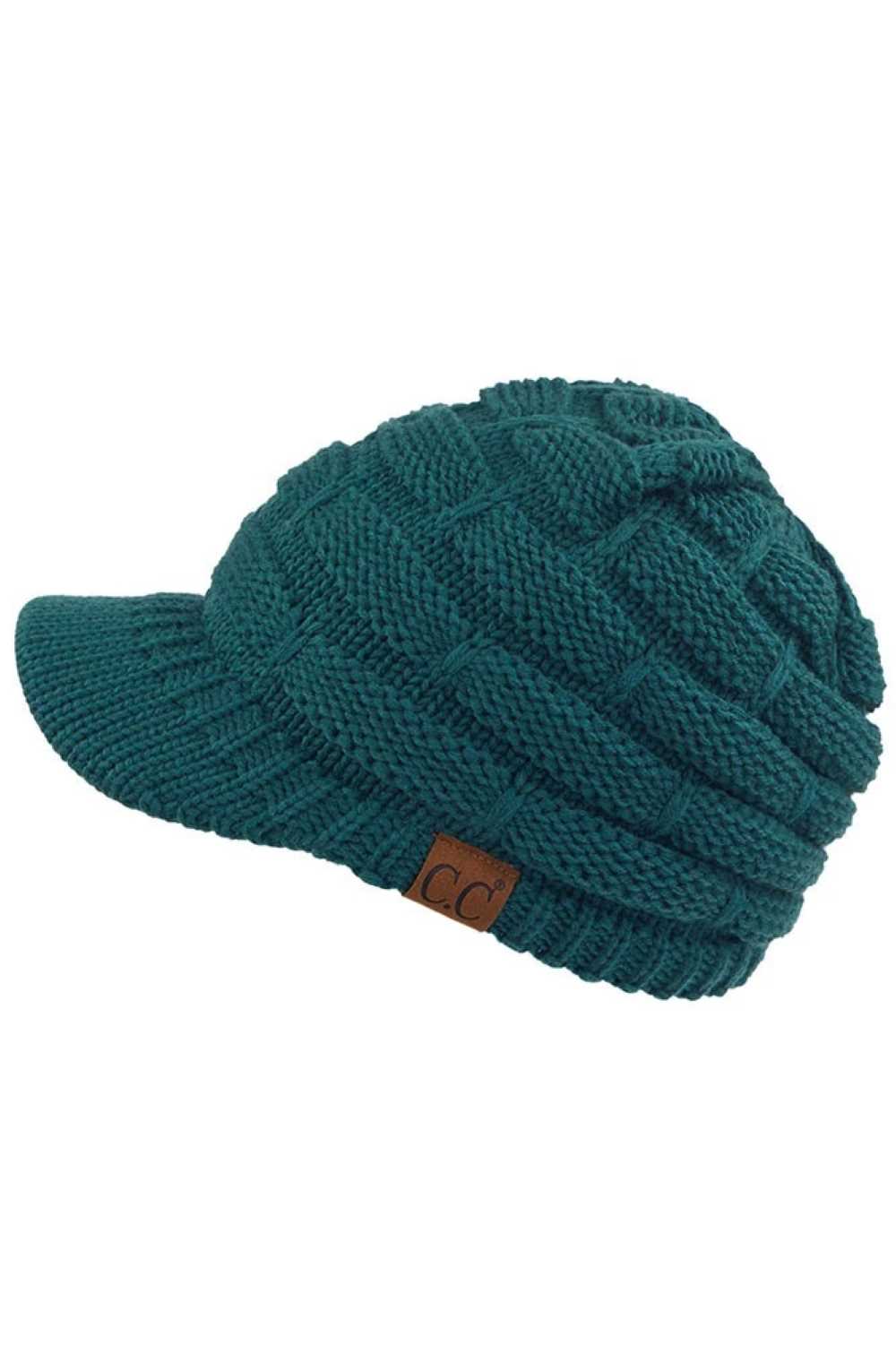 Deep_pine The C.C Ribbed Knit Brim Beanie combines comfort and style in one versatile piece. Made from 100% acrylic, this lightweight beanie features a classic ribbed knit construction with a structured brim for added warmth and coverage. Perfect for casual outings or outdoor activities, it pairs effortlessly with any winter wardrobe.