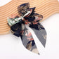 Madeline Love Navy Oversized Sheer Floral Print Bow Barrette - Hair Accessories - desc