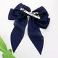 Madeline Love Navy Oversized Pearl Dangle Pointed Bow Barrette - Hair Accessories - desc