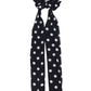 Black C.C. POLKA DOT SASH SCRUNCHIES offer a stylish and practical way to keep hair in place. With their fun polka dot design and handy sash, they are perfect for any hair type. Made with high-quality materials, these scrunchies are durable and comfortable for all-day wear.