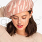 C.C Zebra Wool Beret Beanie merges traditional craftsmanship with contemporary design. Constructed from high-quality wool fibers, this headwear provides exceptional thermal regulation while the distinctive zebra pattern offers visual interest. The beret silhouette delivers a sophisticated profile that complements diverse facial structures and outfitting choices, making it an essential cold-weather accessory for the discerning consumer.