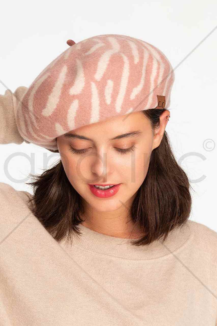 C.C Zebra Wool Beret Beanie merges traditional craftsmanship with contemporary design. Constructed from high-quality wool fibers, this headwear provides exceptional thermal regulation while the distinctive zebra pattern offers visual interest. The beret silhouette delivers a sophisticated profile that complements diverse facial structures and outfitting choices, making it an essential cold-weather accessory for the discerning consumer.