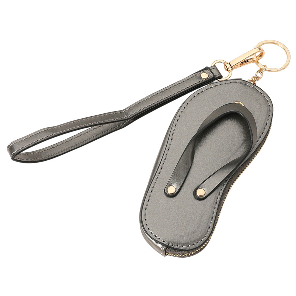 Bronze Faux Leather Flip-flop Mini Wristlet Bag Charm Coin Purse offers a convenient and stylish way to carry your essentials. Made from durable faux leather, this mini wristlet bag doubles as a charm for your larger bag. Keep your coins, keys, or credit cards easily accessible with this sleek and functional accessory.
