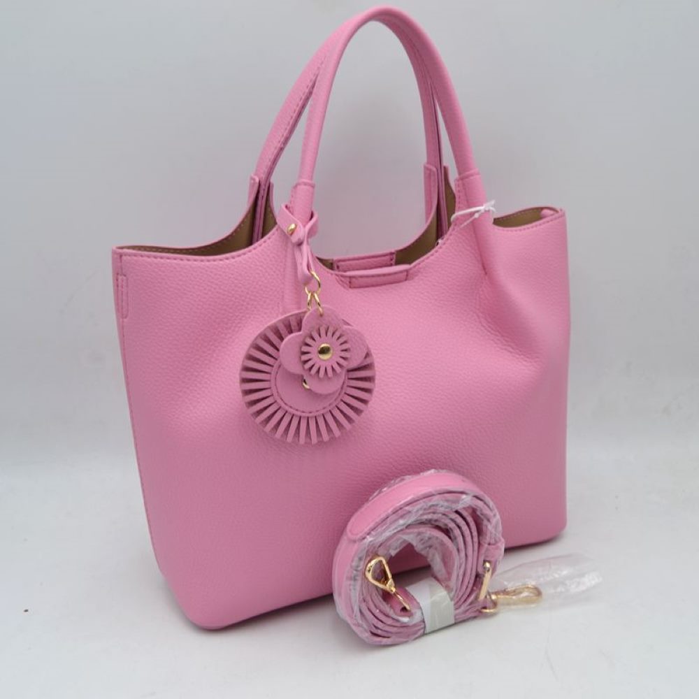 Baby Pink Elevate your everyday style with this versatile and sophisticated&nbsp;pebbled tote. Designed for the modern woman who values both form and function, this bag seamlessly transitions from a professional office setting to a casual weekend outing.