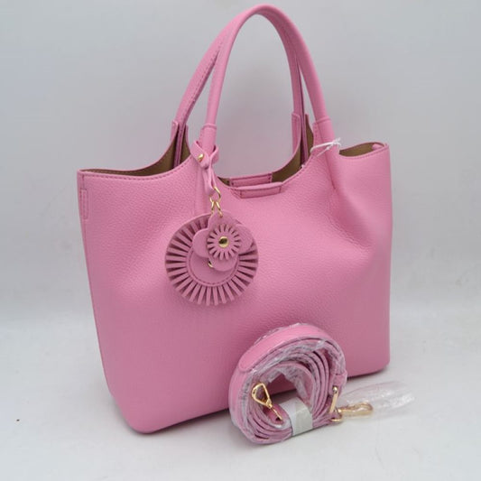 Baby Pink Elevate your everyday style with this versatile and sophisticated&nbsp;pebbled tote. Designed for the modern woman who values both form and function, this bag seamlessly transitions from a professional office setting to a casual weekend outing.