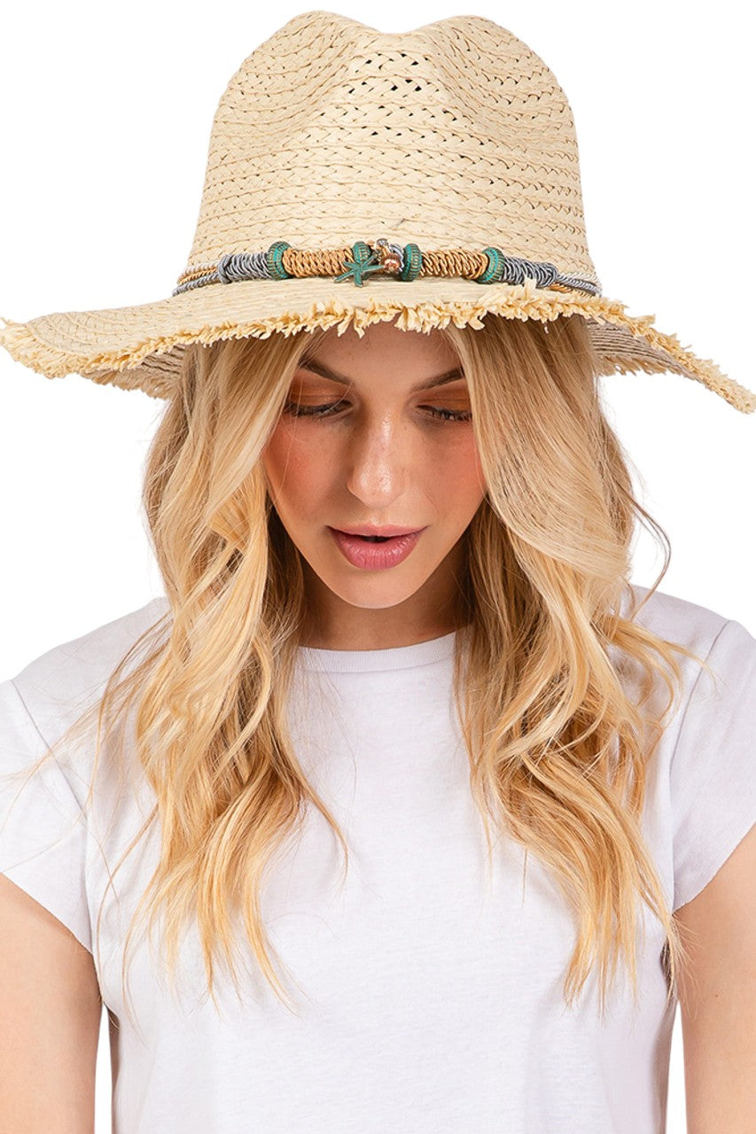 Beige Braided Starfish Band Frayed Straw Summer Sun Hat features a distinctive braided starfish band and stylish frayed edges. The wide brim provides optimal UV protection while maintaining breathability, making it an essential accessory for beach outings, resort wear, or any outdoor summer activity. Lightweight construction ensures all-day comfort.
