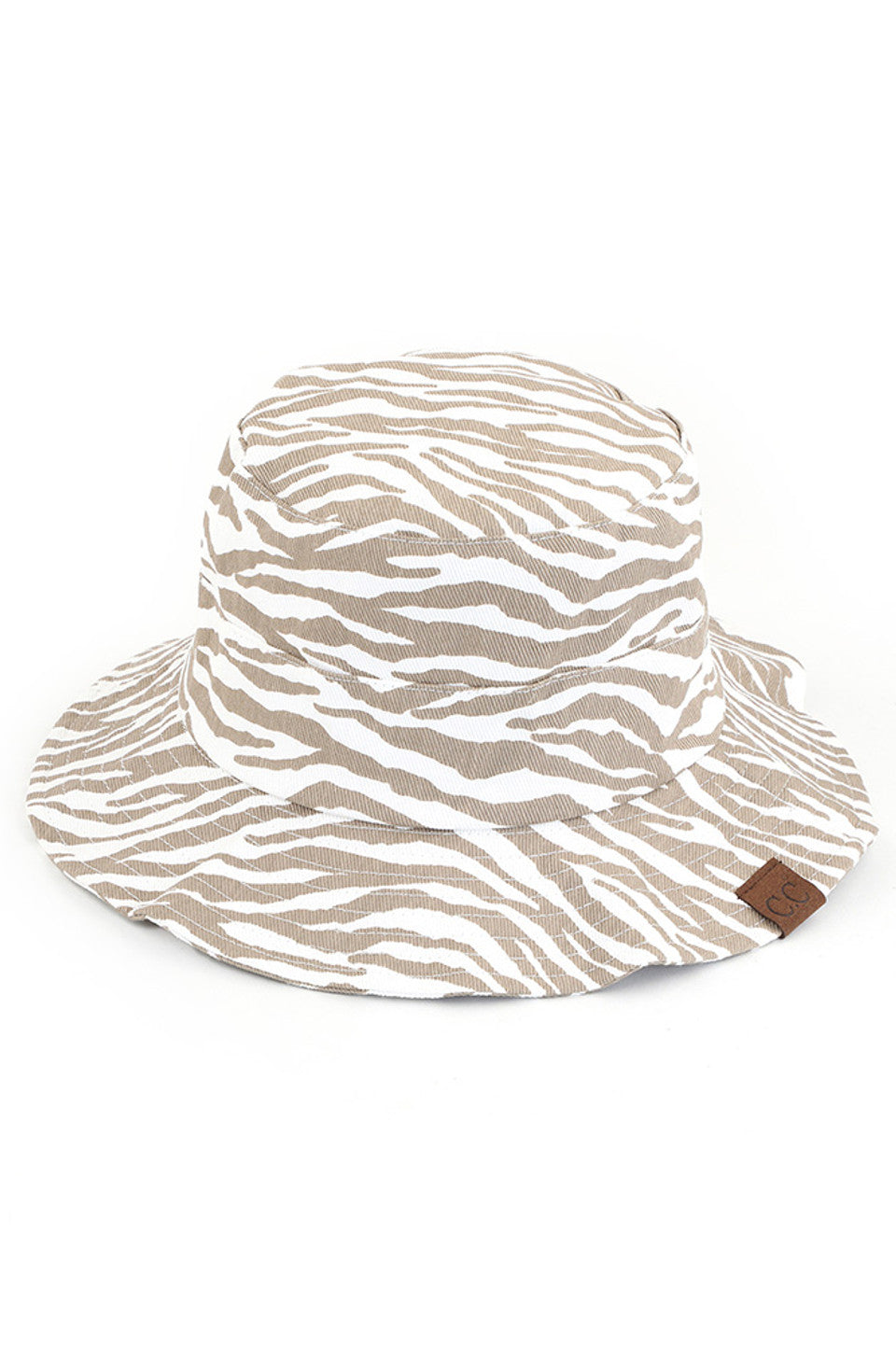Beige C.C. ZEBRA PRINT BUCKET HAT is the perfect accessory for any outdoor adventure. Made from high-quality materials, it offers both style and functionality. Stay protected from the sun and make a statement with its bold zebra print design. Trust in C.C. for expertly crafted hats.