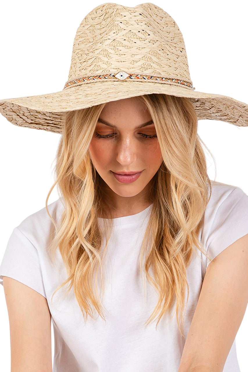 Beige Evil Eye braided band sun hat offers superior protection against harsh summer rays while maintaining breathability. The distinctive evil eye motif adds a sophisticated touch to casual outfits. Lightweight construction ensures comfort during extended wear, making it an essential accessory for beach outings, garden parties, or everyday sun protection.