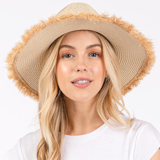Beige Frayed Band and Trip Straw Sun Hat combines style and practicality. The frayed band adds a touch of texture, while the trip straw material provides superior sun protection. Perfect for a day at the beach or a stroll in the park, this hat will keep you both fashionable and protected.