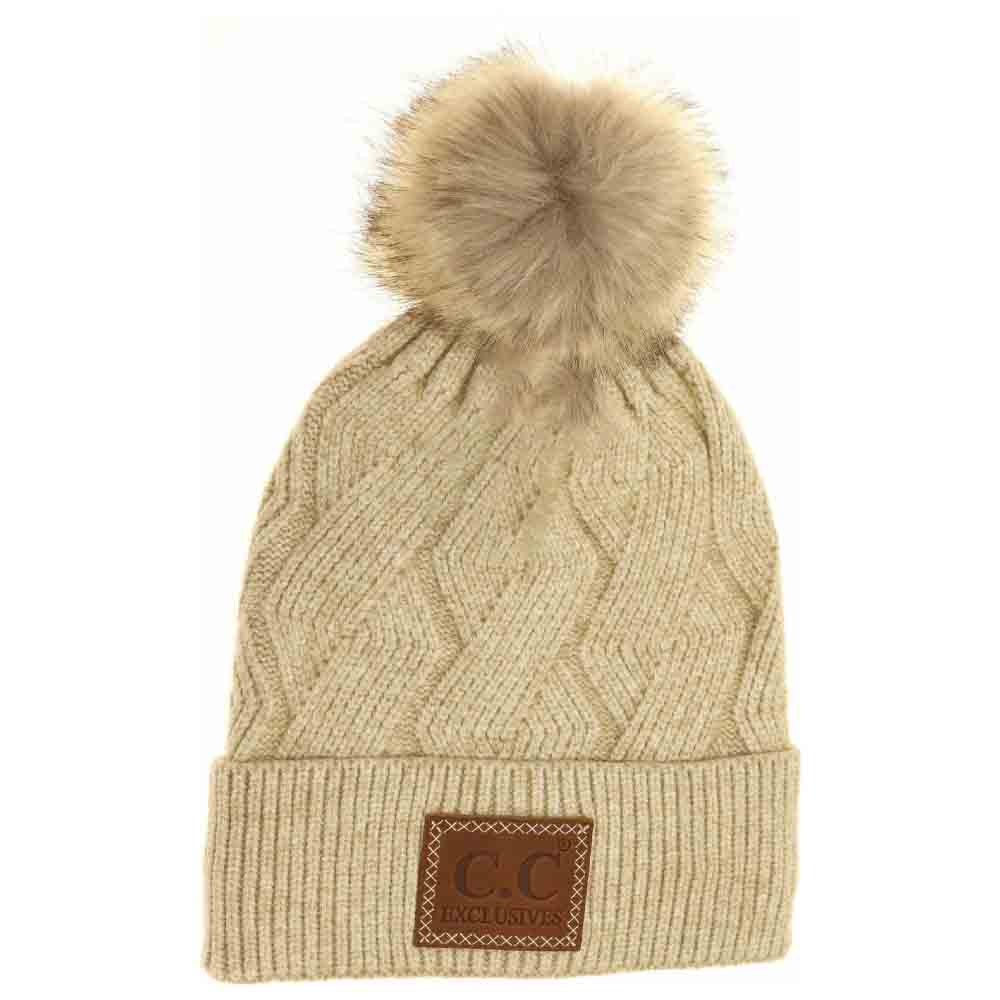 Beige Geometric Knit Faux Fur Pom Beanie combines expert craftsmanship with functional design. Featuring a detailed geometric knit pattern, this beanie provides both insulation and refined visual appeal. The plush faux fur pom adds a sophisticated accent while enhancing warmth, making it an ideal accessory for cold weather. Durable and comfortable, it seamlessly blends style and practicality for discerning wearers. 