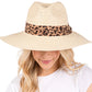 Beige Leopard Band Straw Sun Hat features a leopard print band for a touch of personality. Made of durable straw, it protects from the sun's harsh rays. Stay cool and fashionable while lounging on the beach or exploring the city. 