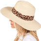 Beige Leopard Band Straw Sun Hat features a leopard print band for a touch of personality. Made of durable straw, it protects from the sun's harsh rays. Stay cool and fashionable while lounging on the beach or exploring the city. 