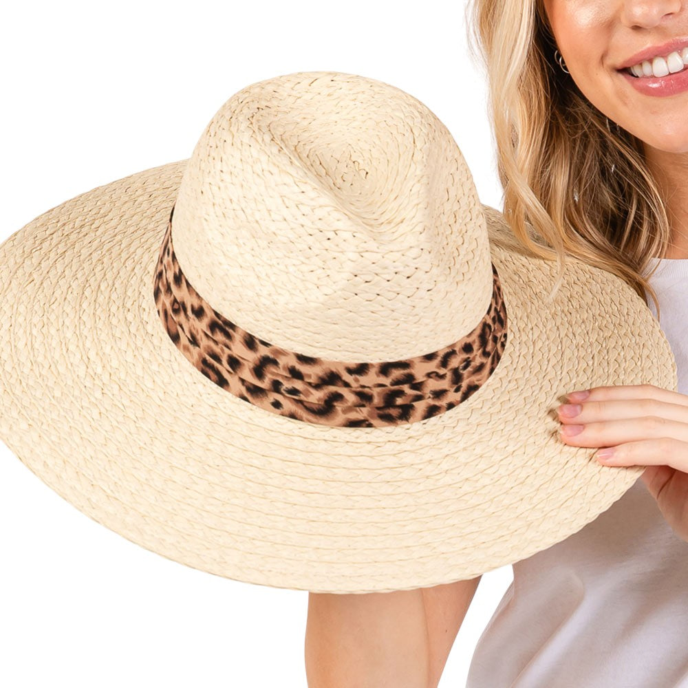 Beige Leopard Band Straw Sun Hat features a leopard print band for a touch of personality. Made of durable straw, it protects from the sun's harsh rays. Stay cool and fashionable while lounging on the beach or exploring the city. 