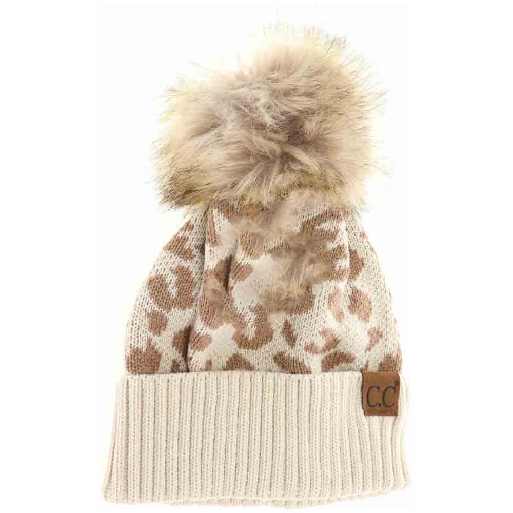 Beige Leopard Pattern Fur Pom Beanie offers a sophisticated blend of fashion and function. Designed with a striking leopard print and topped with a plush fur pom, this beanie provides exceptional warmth without compromising style. Its high-quality construction ensures a comfortable fit that locks in heat, making it the perfect accessory to elevate your cold-weather wardrobe with expert flair. 

