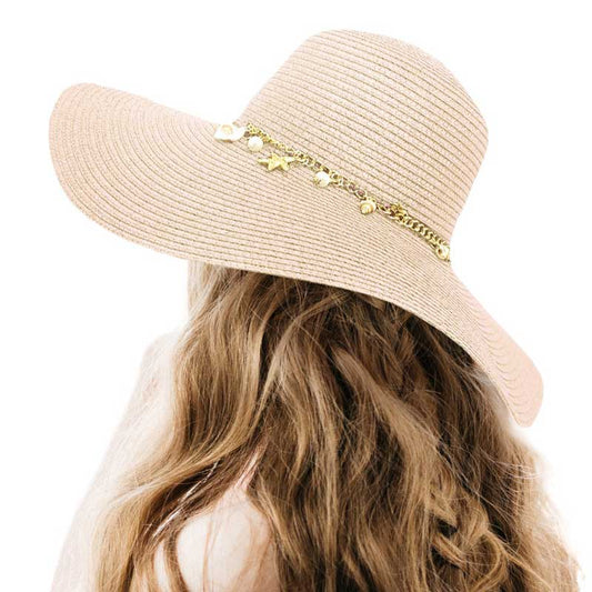 Beige Pearl Starfish Shell Charm Band Pointed Straw Sun Hat, is perfect for any beach or outdoor occasion. The beautifully crafted pearl and shell band adds a touch of glamour, while the pointed straw design provides ample shade and breathability. Stay stylish and protected from the sun with this must-have accessory. 