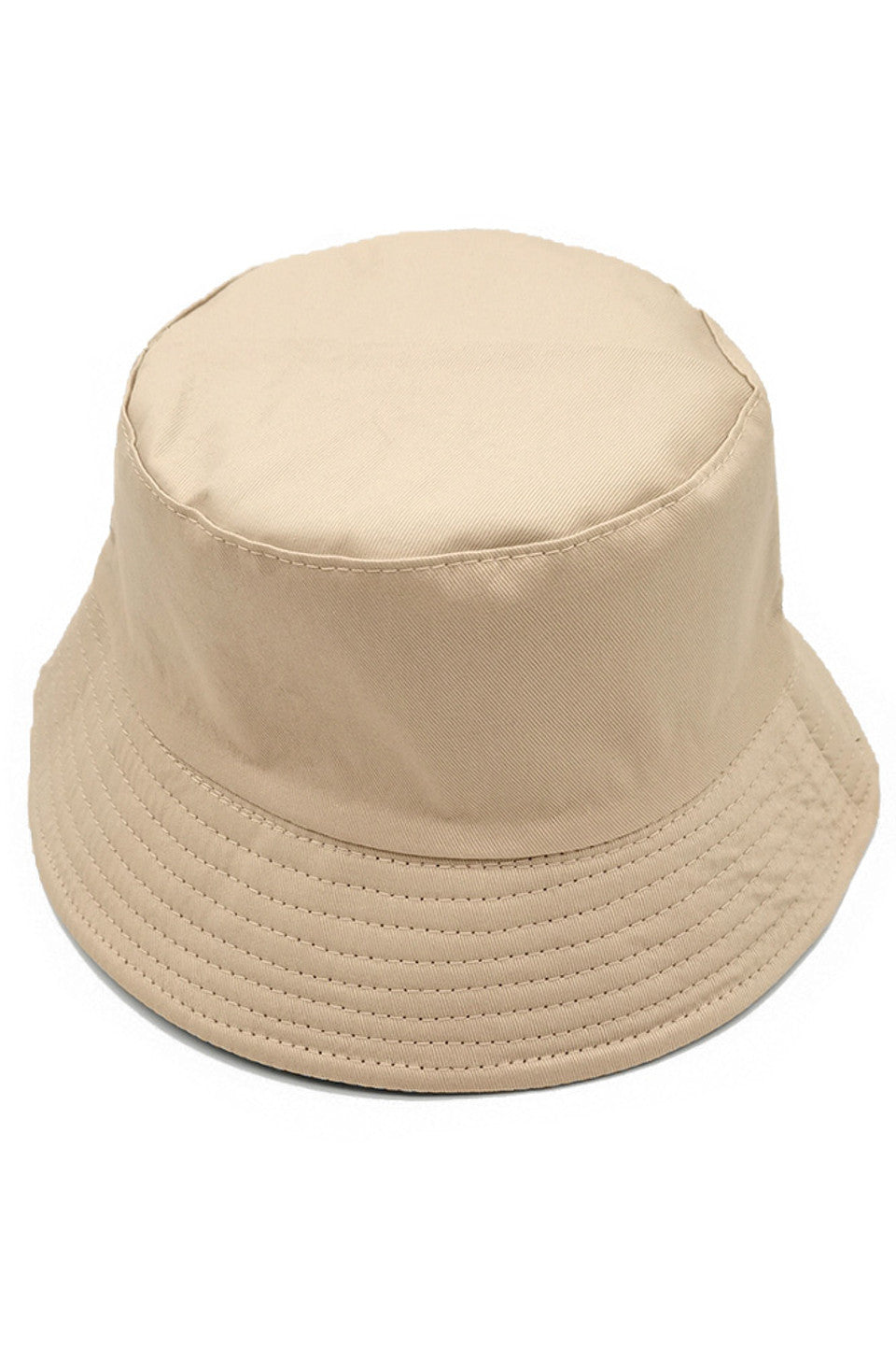 Beige SOLID BUCKET HAT is crafted with durable materials for lasting quality. Features a classic silhouette with all-around sun protection and a comfortable fit. Versatile design pairs effortlessly with casual outfits while providing functional style for outdoor activities. The solid color ensures maximum wardrobe compatibility. 