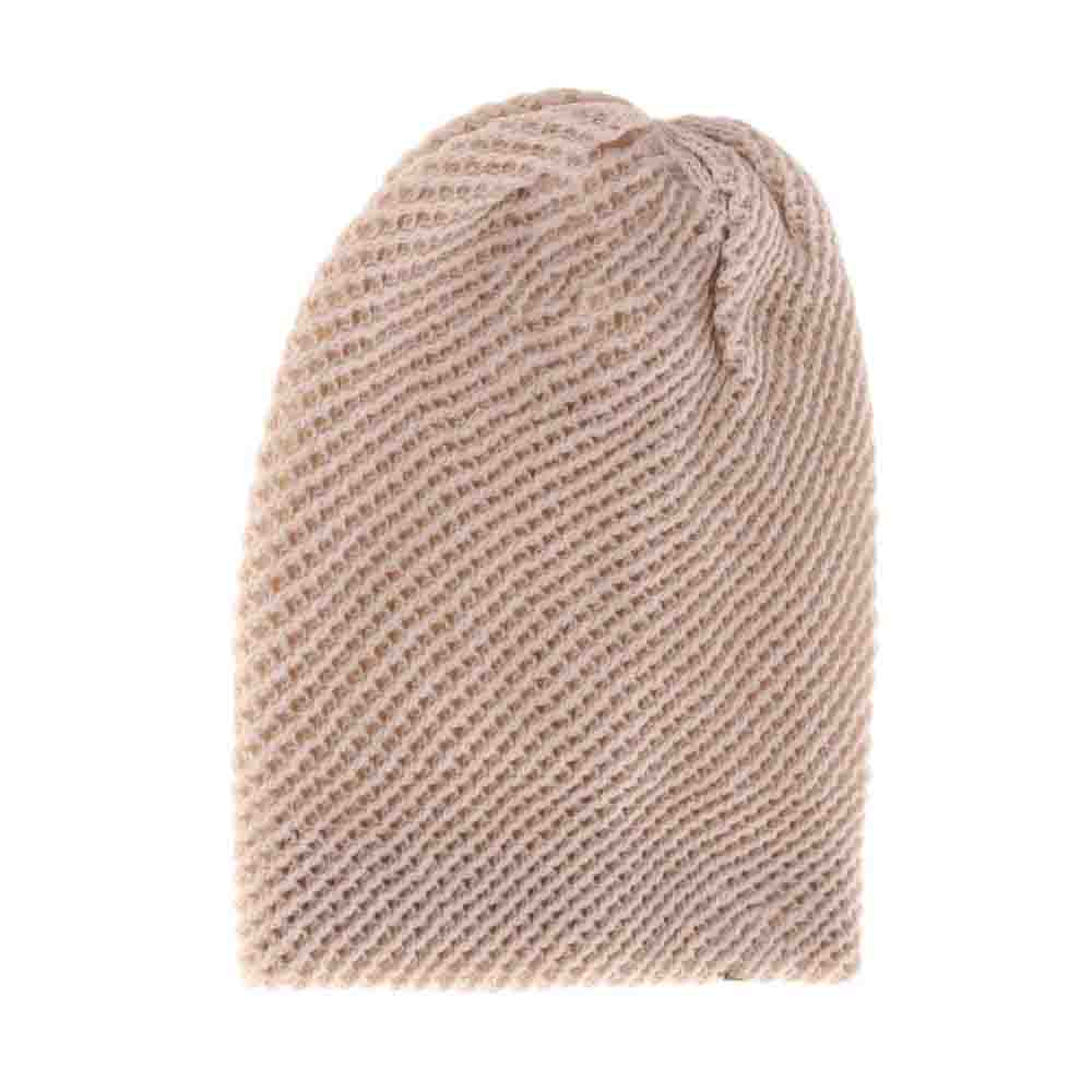 Beige Unisex Slouchy C.C Beanie combines modern style with comfortable warmth, featuring a relaxed fit that suits all head shapes. Crafted from soft, breathable fabric, it offers lightweight insulation while maintaining breathability. Its versatile design makes it ideal for everyday wear, ensuring an effortlessly stylish look for any season. Durable and easy to care for, this beanie balances fashion and function with expert precision.